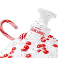 Sugar Addict Eau de Parfum bottle surrounded by festive decoration and candy canes, embodying sweet indulgence in fragrance.