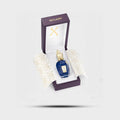 Xerjoff Torino 24 perfume bottle in elegant packaging, showcasing its luxurious design and vibrant blue color.